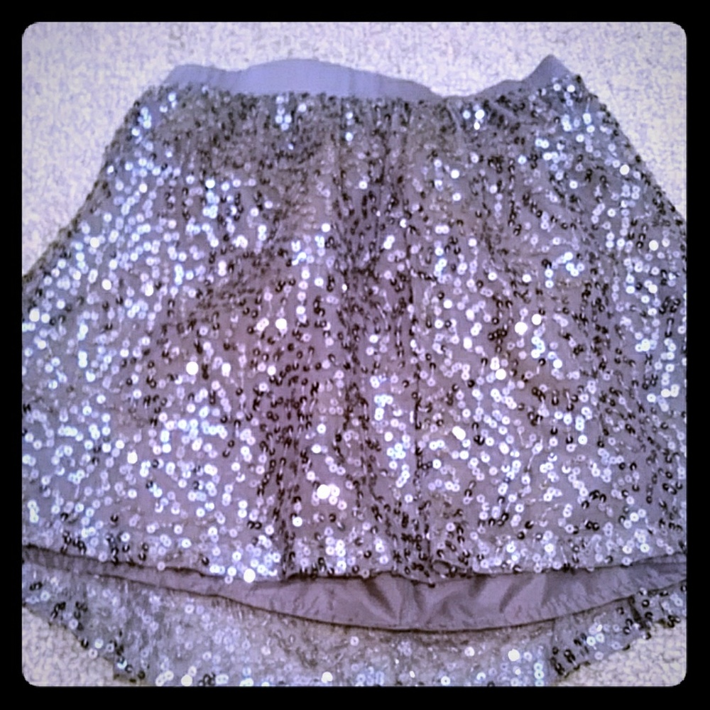A grey sparkle skirt